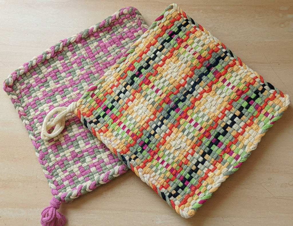 Colorful woven bag on a textured surface with a blurred background
